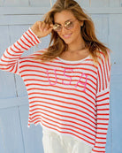 apple-red-breaker-white-stripe